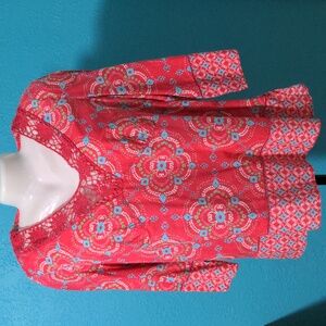 Harold's red printed blouse